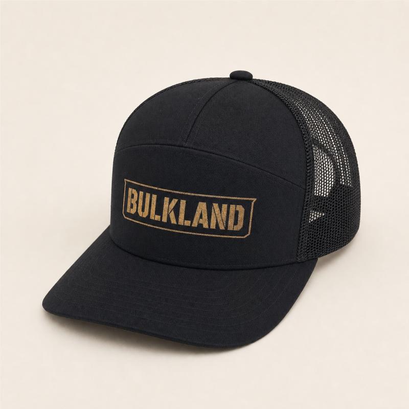 Black Bulkland AO trucker hat from the front three-quarter angle on a warm Bone background